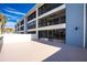 Private balcony with view of building and neighborhood at 1501 Beach Rd # 209, Englewood, FL 34223
