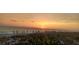 Spectacular sunset view over the beach with people enjoying the scene at 1501 Beach Rd # 209, Englewood, FL 34223