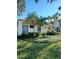 Attractive single story home with lush green lawn and landscaping at 1501 Beach Rd # 209, Englewood, FL 34223