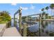 Convenient boat lift for easy water access at 15204 Aquarius Cir, Port Charlotte, FL 33981
