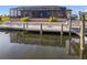 Private dock with seating area and canal views at 15204 Aquarius Cir, Port Charlotte, FL 33981