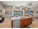 Modern kitchen with a large island and stainless steel appliances at 15204 Aquarius Cir, Port Charlotte, FL 33981