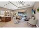 Bright living room with vaulted ceilings and access to a lanai at 15204 Aquarius Cir, Port Charlotte, FL 33981