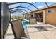 Enjoy dining al fresco by the pool and spa at 15204 Aquarius Cir, Port Charlotte, FL 33981