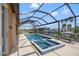 Enjoy this large pool and spa with canal views at 15204 Aquarius Cir, Port Charlotte, FL 33981