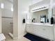 Double vanity bathroom with a walk-in shower and toilet at 1577 Monarch Dr # 1577, Venice, FL 34293