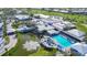 Large clubhouse near golf course with pool and fountain at 1577 Monarch Dr # 1577, Venice, FL 34293