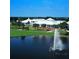 Luxury clubhouse near golf course and pond with fountain at 1577 Monarch Dr # 1577, Venice, FL 34293