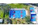 Aerial view of well-maintained tennis and pickleball courts at 1577 Monarch Dr # 1577, Venice, FL 34293