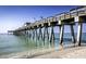 Wooden pier over calm ocean water at 1577 Monarch Dr # 1577, Venice, FL 34293