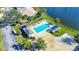 Community pool with lake views and convenient parking at 1577 Monarch Dr # 1577, Venice, FL 34293