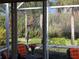 Peaceful screened porch overlooking a garden at 1577 Monarch Dr # 1577, Venice, FL 34293