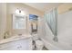 Bathroom with tub, shower, and vanity at 18198 Burkholder Cir, Port Charlotte, FL 33948