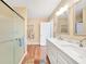 Double vanity bathroom with a shower at 18198 Burkholder Cir, Port Charlotte, FL 33948