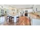 Bright kitchen with white cabinets, stainless steel appliances, and an island at 18198 Burkholder Cir, Port Charlotte, FL 33948