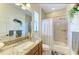 Bathroom with granite vanity and shower/tub combo at 237 Albatross Rd, Rotonda West, FL 33947