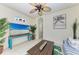 Gathering room with large TV and pool view at 237 Albatross Rd, Rotonda West, FL 33947