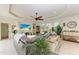 Relaxing living room featuring large TV and comfortable seating at 237 Albatross Rd, Rotonda West, FL 33947