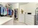 Large walk-in closet with ample shelving and hanging space at 237 Albatross Rd, Rotonda West, FL 33947