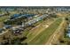 Aerial view of home on golf course community at 30 Oakland Hills Pl, Rotonda West, FL 33947