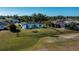 Aerial view of a single-story home in a residential neighborhood at 30 Oakland Hills Pl, Rotonda West, FL 33947