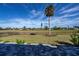 Backyard patio overlooks a golf course at 30 Oakland Hills Pl, Rotonda West, FL 33947