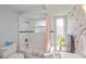 Clean bathroom with white subway tile and a shower/tub combo at 30 Oakland Hills Pl, Rotonda West, FL 33947