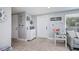 Bright and airy entryway with coastal-themed decor at 30 Oakland Hills Pl, Rotonda West, FL 33947