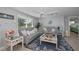 Open concept living area with coastal decor and comfortable seating at 30 Oakland Hills Pl, Rotonda West, FL 33947