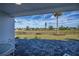 Covered patio overlooking a golf course at 30 Oakland Hills Pl, Rotonda West, FL 33947