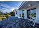 Outdoor patio area with seating and golf course view at 30 Oakland Hills Pl, Rotonda West, FL 33947