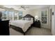Spacious bedroom with a king-size bed and ample natural light at 33 Seawatch Dr, Boca Grande, FL 33921