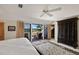 Main bedroom with king bed and access to balcony at 33 Seawatch Dr, Boca Grande, FL 33921