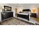 Spacious bedroom with dark wood furniture and rug at 33 Seawatch Dr, Boca Grande, FL 33921