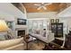 Comfortable living room with fireplace and high ceilings at 33 Seawatch Dr, Boca Grande, FL 33921