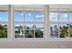 Stunning ocean and neighborhood view from large windows at 33 Seawatch Dr, Boca Grande, FL 33921