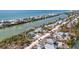 Aerial view of the property, nestled near the canal and the beach, highlighted with a white circle at 331 Bocilla Dr, Placida, FL 33946