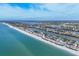 Breathtaking aerial view of beach homes nestled between turquoise ocean and tranquil waterways at 331 Bocilla Dr, Placida, FL 33946