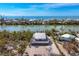 Stunning aerial view of a coastal home close to the beach and scenic waterways at 331 Bocilla Dr, Placida, FL 33946