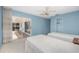 Bright bedroom with access to patio overlooking pool at 36 Bunker Cir, Rotonda West, FL 33947