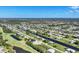 Expansive aerial view of the neighborhood, highlighting its waterfront location at 39 Tournament Rd, Rotonda West, FL 33947