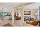 Spacious living area with high ceilings, an open floor plan and ample natural light at 39 Tournament Rd, Rotonda West, FL 33947