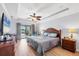 Spacious main bedroom with private access to the pool area at 39 Tournament Rd, Rotonda West, FL 33947