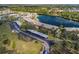 Scenic aerial view showing the lakefront condo community nestled among trees and landscaping at 4072 Oakview Dr # C8, Punta Gorda, FL 33980