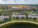 Community featuring well-maintained landscaping, lakefront condos, a pool, and ample parking at 4072 Oakview Dr # C8, Punta Gorda, FL 33980