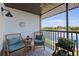 Enjoy tranquil water views from this screened lanai, furnished with comfortable seating and stylish decor at 4072 Oakview Dr # C8, Punta Gorda, FL 33980