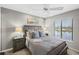 Bedroom featuring a view of the water, neutral tones, a comfy bed, and soft lighting at 4072 Oakview Dr # C8, Punta Gorda, FL 33980