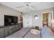 Bedroom featuring a large dresser with television and ensuite bathroom at 4072 Oakview Dr # C8, Punta Gorda, FL 33980