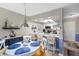 Bright dining area adjacent to the kitchen, featuring stylish decor, and barstool seating at 4072 Oakview Dr # C8, Punta Gorda, FL 33980