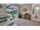 Bedroom with pool view, workspace, and en-suite bathroom at 5 Broadmoor Ln, Rotonda West, FL 33947